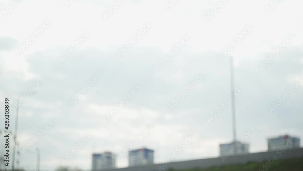 Young woman is wearing headphone for music motivation and running away Young woman is wearing headphone for music motivation and running away