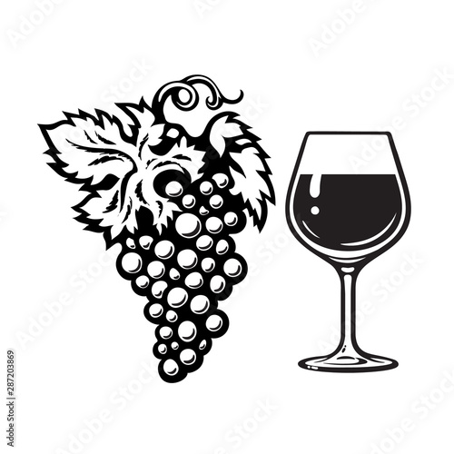 Bunch of grapes and glass of wine in engraving style. Wine icon. Black and white vector illustration on white background.