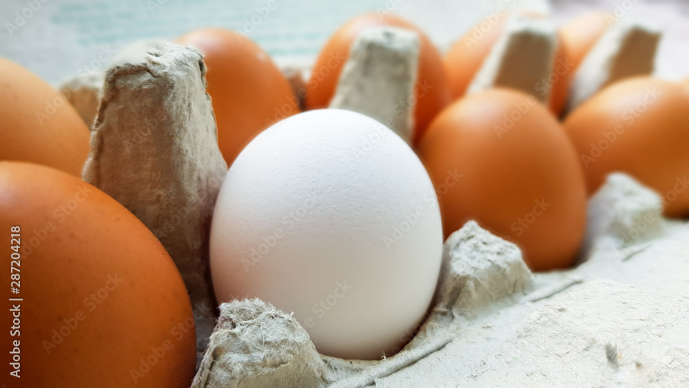 Close up view of raw chicken eggs in an egg box Close up view of raw chicken eggs in an egg box