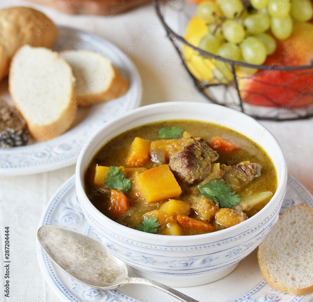 thick soup with pumpkin and beef. hearty autumn dish thick soup with pumpkin and beef. hearty autumn dish