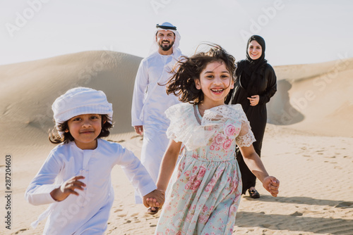 Photography Arabian family spending a weekend in the desert, in Dubai