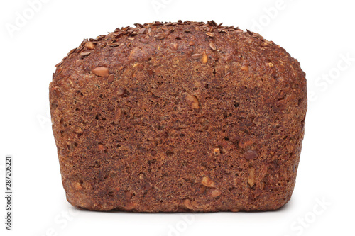 Loaf of rye bread with linseeds and sunflower seeds