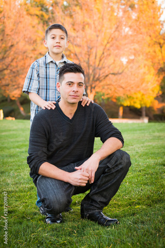 Hispanic Father and Son Por...
