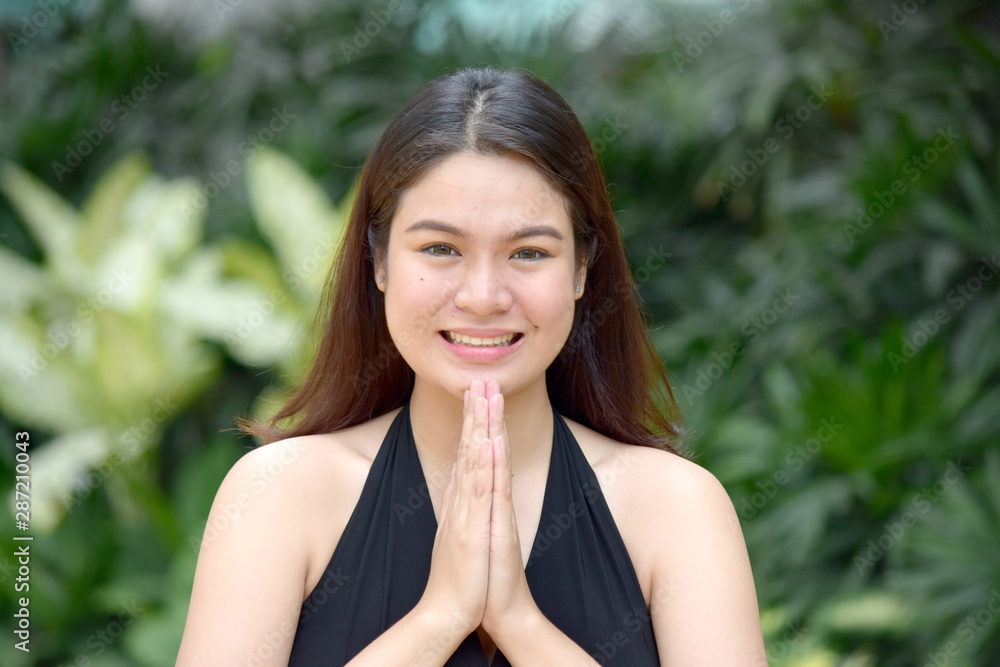 A Beautiful Minority Woman In Prayer A Beautiful Minority Woman In Prayer