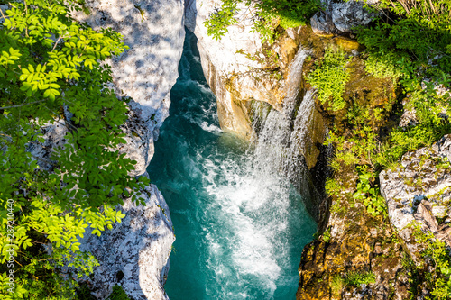 Waterfall to rriver Soca, Velika korita Soce, Triglavski national park, Slovenia photo