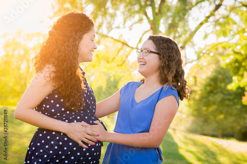 Hispanic Pregnant Mother Wi...