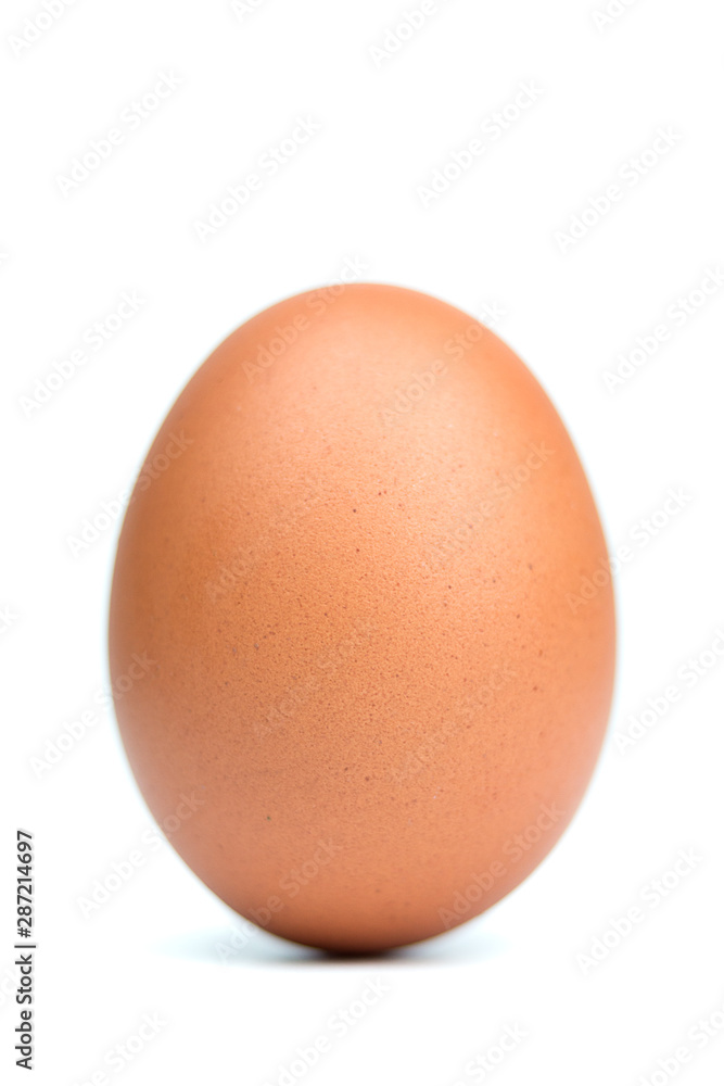 Single brown eggs isolated from white background. Single brown eggs isolated from white background.