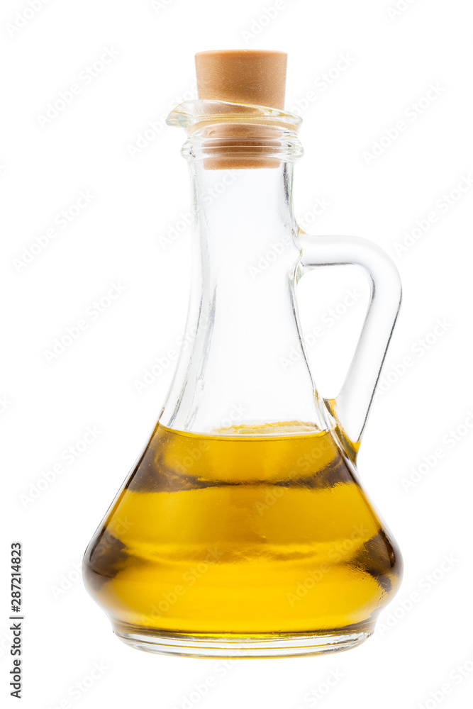 side view of closed glass jug with olive oil side view of closed glass jug with olive oil