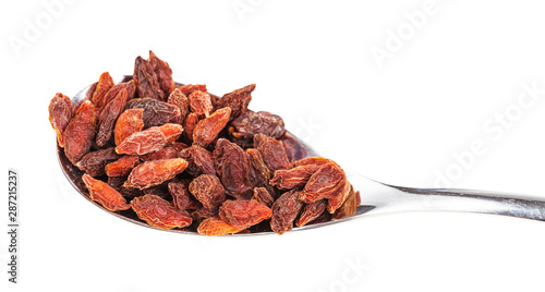 Obraz na płótnie dried goji berries in spoon close-up isolated
