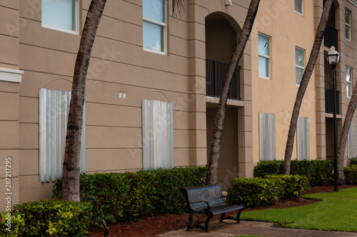 Residents of Miami, Florida, USA are getting ready for Hurricane Dorian. Miami residents protect the windows of houses.  photo