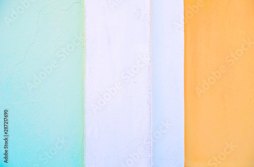 Pale color bands: green white and orange, painted surface, hard light.