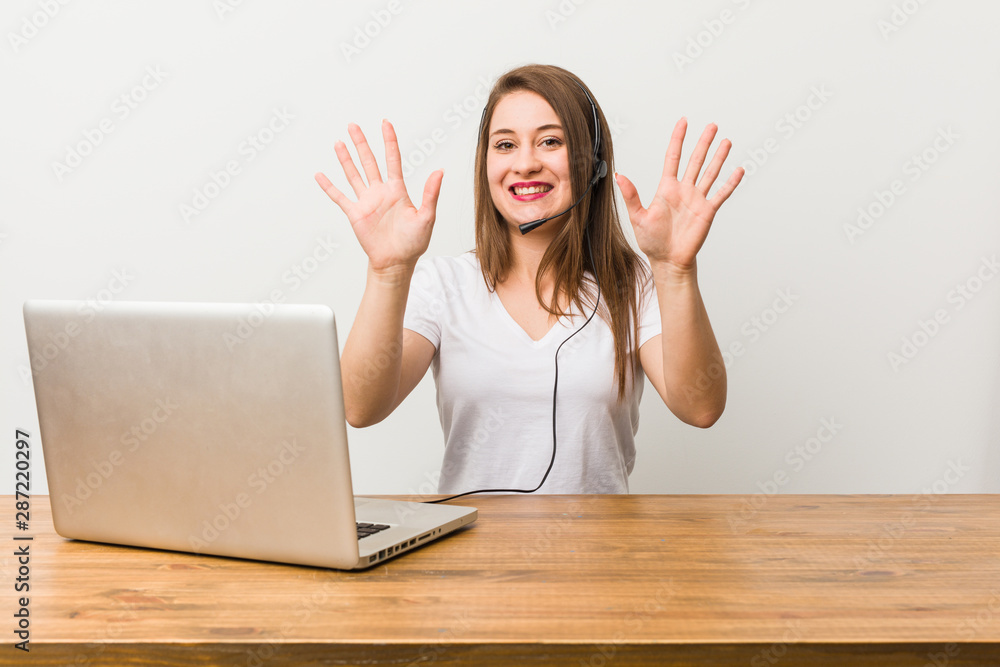 Young telemarketer woman showing number ten with hands. Young telemarketer woman showing number ten with hands.