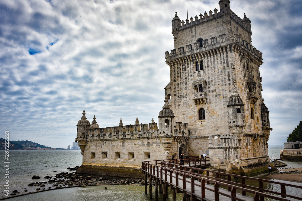 Lisbon, Portugal - July 26, 2019: Belem Tower, a medievel fortress overlooking the Tagus river estuary Lisbon, Portugal - July 26, 2019: Belem Tower, a medievel fortress overlooking the Tagus river estuary