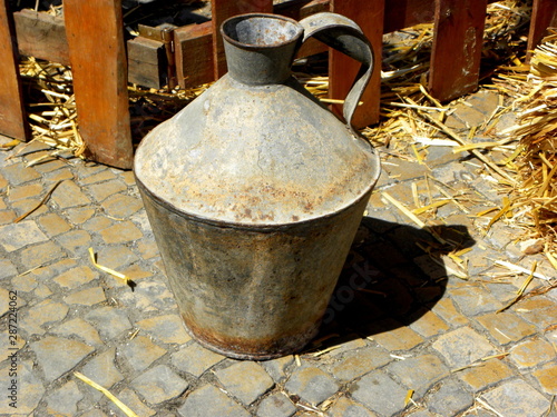 big old iron jug, antiques