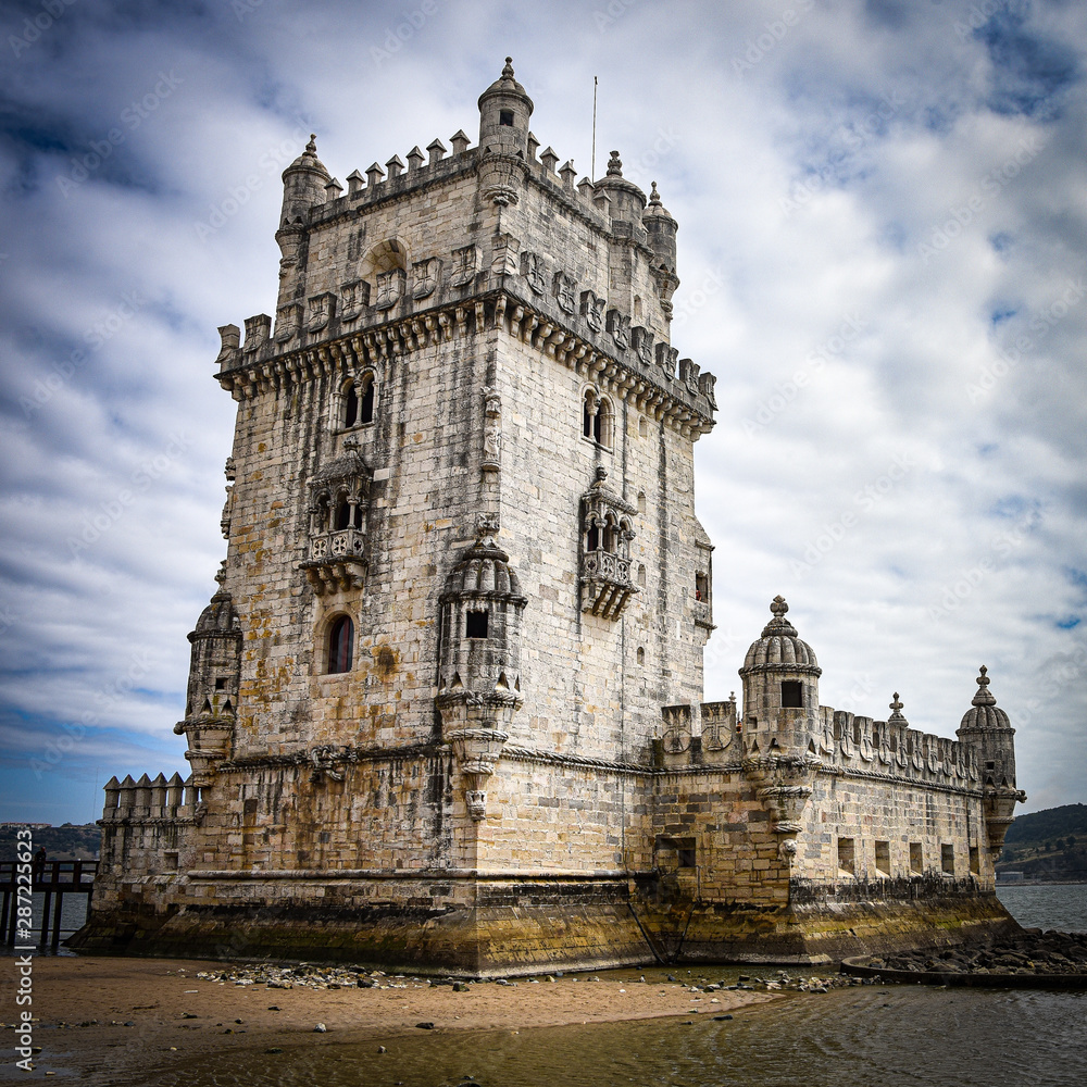 Lisbon, Portugal - July 26, 2019: Belem Tower, a medievel fortress overlooking the Tagus river estuary Lisbon, Portugal - July 26, 2019: Belem Tower, a medievel fortress overlooking the Tagus river estuary
