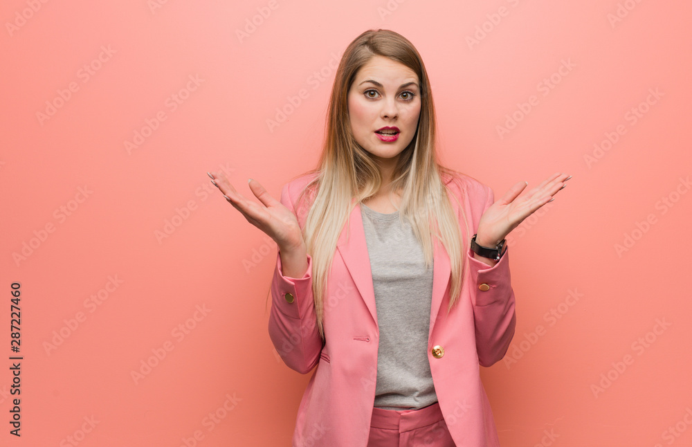 Young russian woman wearing pajama surprised and shocked Young russian woman wearing pajama surprised and shocked