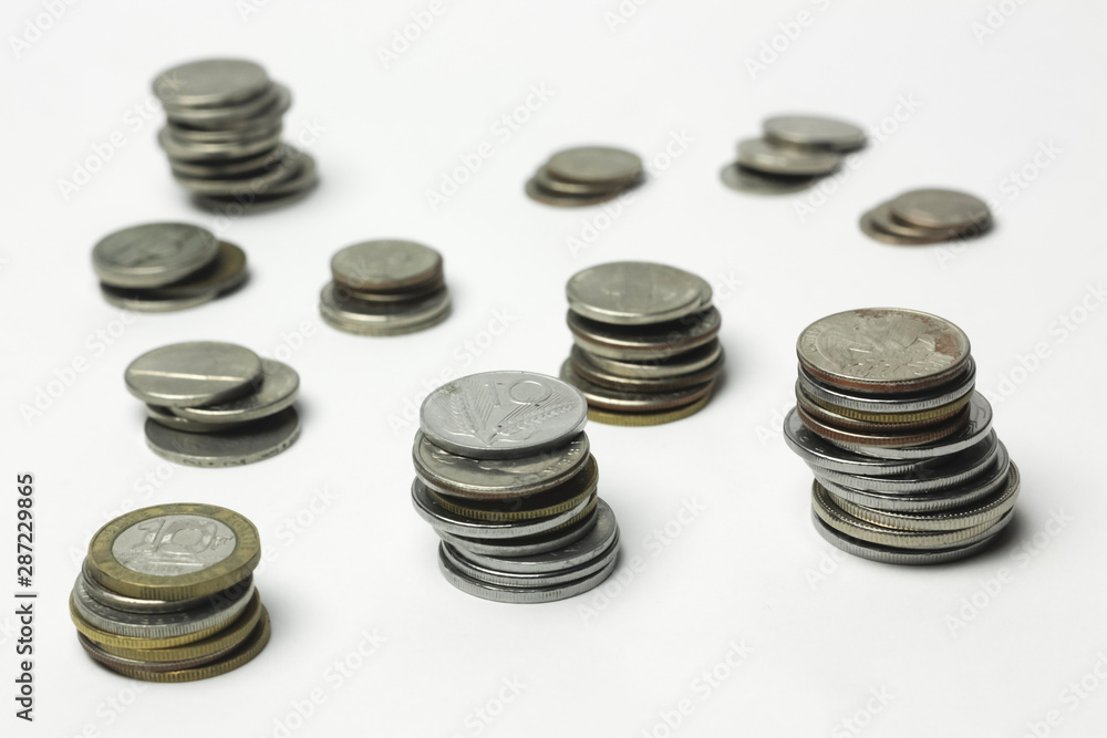 stacks of coins isolated on white stacks of coins isolated on white