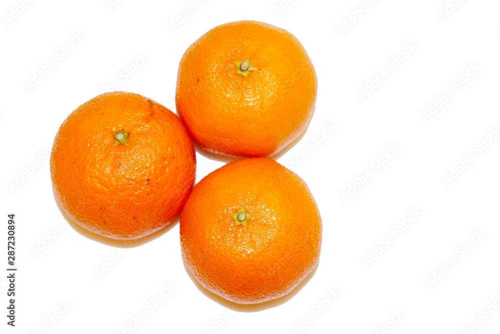 Three mandarins isolated on white background and space for your text. Three mandarins isolated on white background and space for your text.