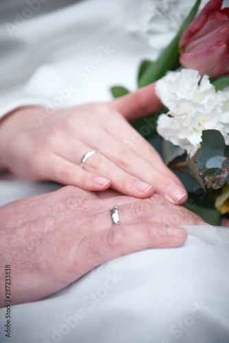 Loving couple holding hands with rings. happy wedding day © Олександр Болюх
