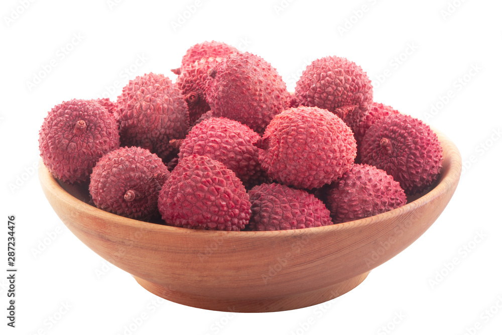 heap of lychees with rind isolated on white background in wooden plate heap of lychees with rind isolated on white background in wooden plate