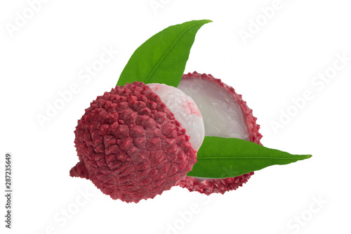 two  lychee with green leaves isolated on white background