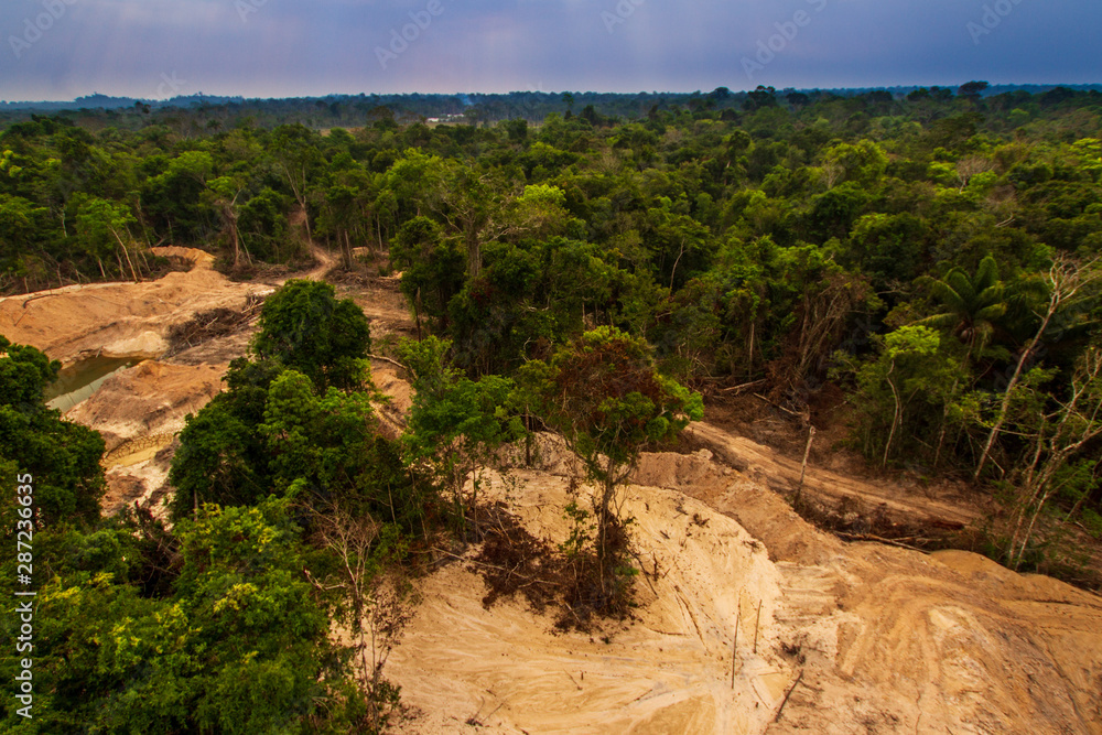 Illegal mining causes deforestation and river pollution in the Amazon rainforest near Menkragnoti Indigenous Land. - Pará, Brazil Illegal mining causes deforestation and river pollution in the Amazon rainforest near Menkragnoti Indigenous Land. - Pará, Brazil
