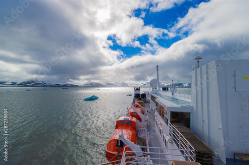 HORNSUND, SVALBARD, NORWAY – JULY 26, 2010:  Cruise ship in the Arctic, Hornsund, Norway photo