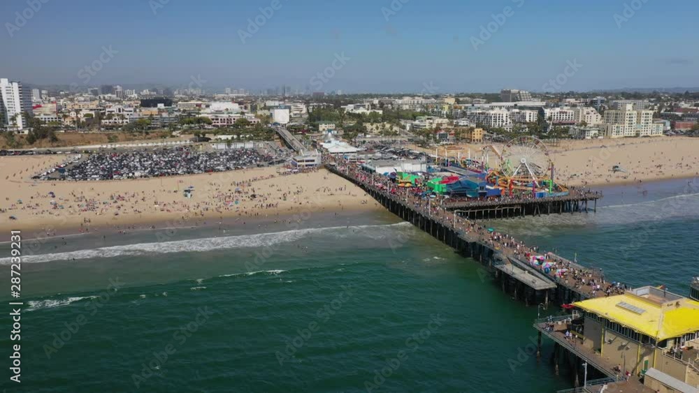 Aerial: Vacationers Swarm the Beach and Santa Monica Pier on a Beautiful Sunny Day - Santa Monica, California Aerial: Vacationers Swarm the Beach and Santa Monica Pier on a Beautiful Sunny Day - Santa Monica, California
