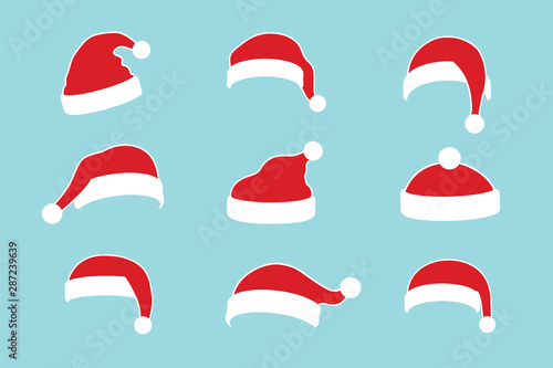 Santa Claus hat flat set. Realistic Santa Claus hat isolated blue background. Red funny cap silhouette. Merry Christmas clothes cute cartoon design. New year decoration costume. Vector illustration