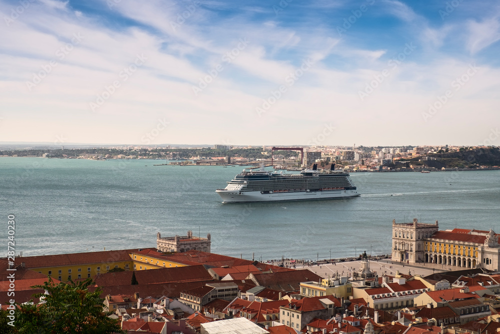 Aerial view from Castle of Saint George or Sao Jorge to the historical centre of Lisbon and luxury cruise ship with the Tagus river, the 25th of April bridge, Lisbon, Portugal, Lisboa 