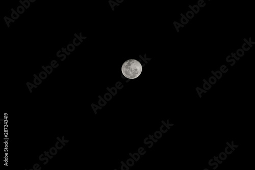 Half Moon Background / The Moon is an astronomical body that orbits planet Earth, being Earth's only permanent natural satellite