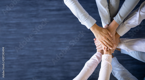 Stack of hands. Unity and teamwork concept.