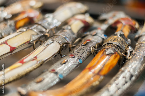 Oriental daggers / Background of different oriental daggers in a souk.