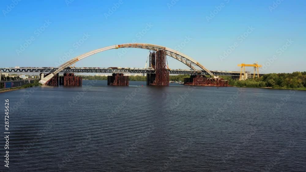 Arch bridge under construction over the river Dnepr Arch bridge under construction over the river Dnepr