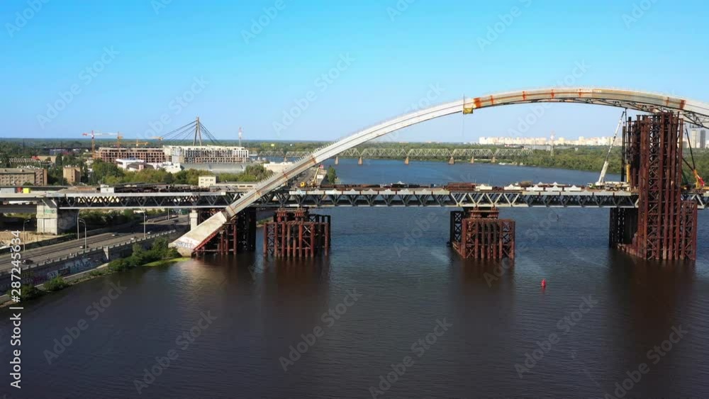 Arch bridge under construction over the river Dnepr Arch bridge under construction over the river Dnepr
