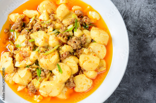 Mapo Tofu, popular Chinese dish. The classic recipe consists of silken tofu, ground pork or beef and Sichuan peppercorn to name a few main ingredients.