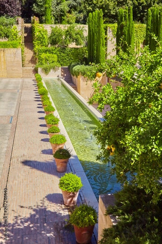Famous garden in the Alhambra at Granada in Spain. © Composer