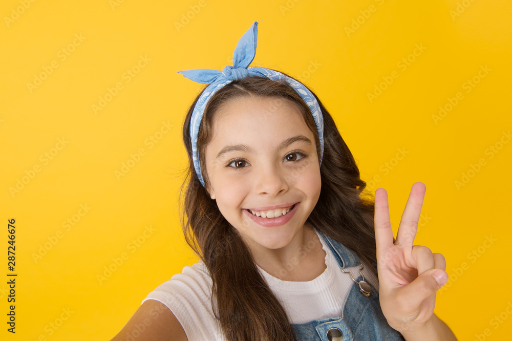Peace. Positive emotions. Cheerful teen. Feel happiness. This how happiness looks like. Happy smiling kid girl close up face. Emotional expression. Express happiness. Emotional child concept Peace. Positive emotions. Cheerful teen. Feel happiness. This how happiness looks like. Happy smiling kid girl close up face. Emotional expression. Express happiness. Emotional child concept