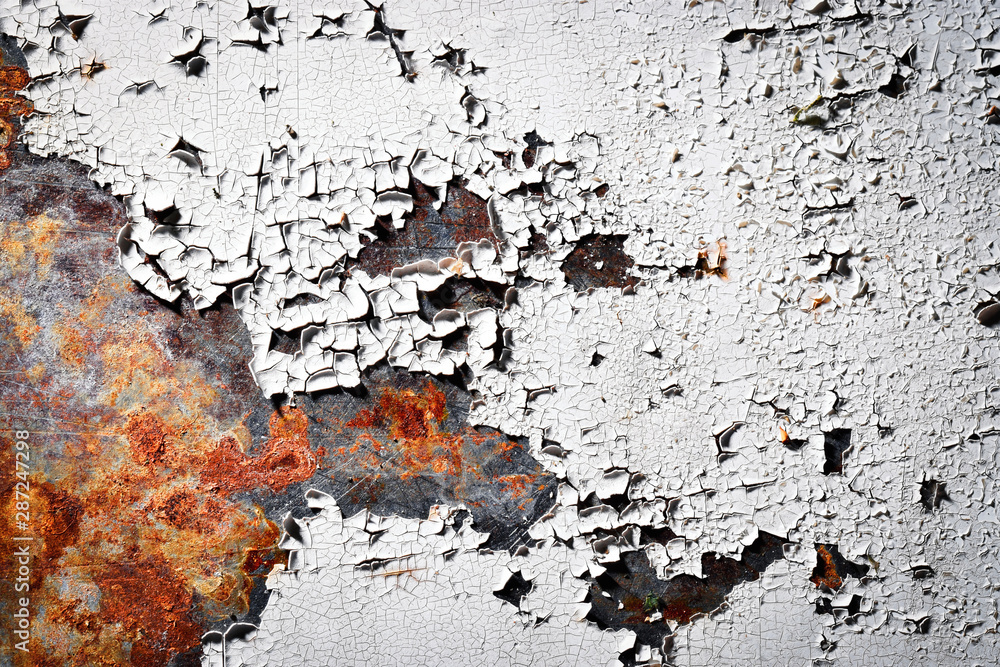 Fototapeta premium old peeled white paint on rusty iron plate