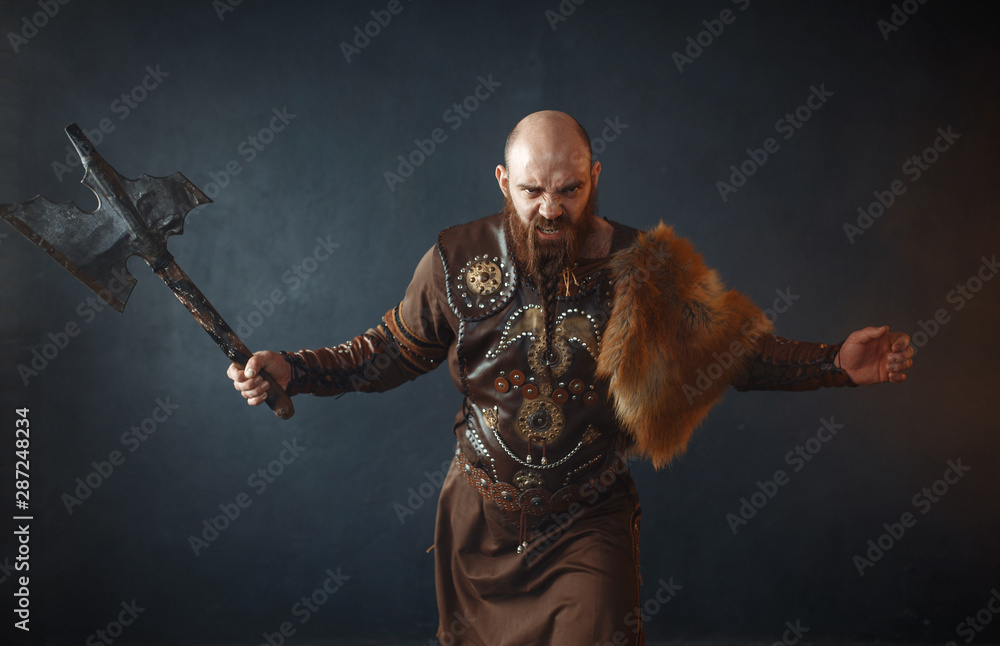 Bearded viking with axe enters the battle