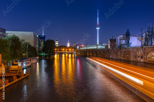 Canvas Print Berlin at night, Jannowitzbridge, Spree river with ships after midinght in summe