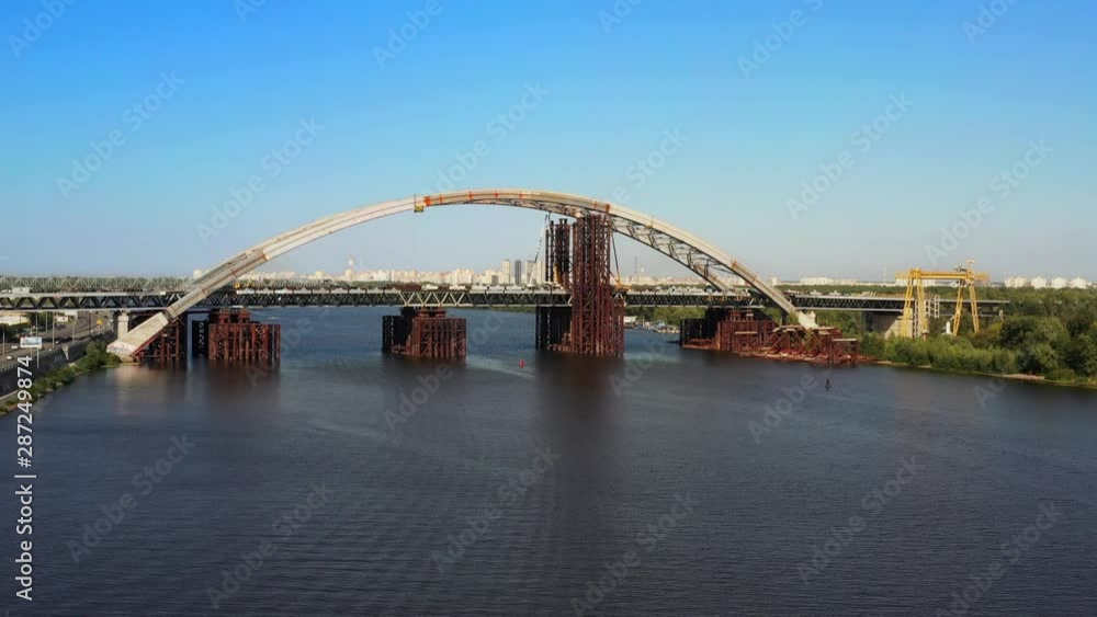 Arch bridge under construction over the river Dnepr Arch bridge under construction over the river Dnepr