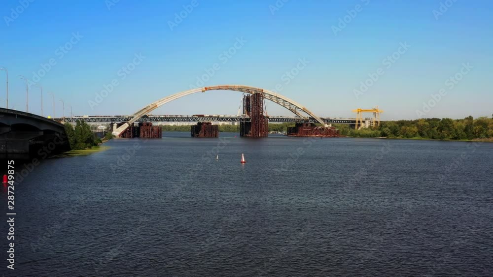 Arch bridge under construction over the river Dnepr Arch bridge under construction over the river Dnepr