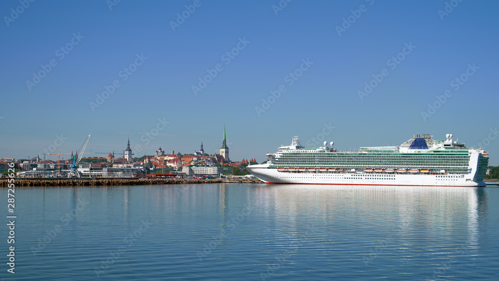 Huge white cruise ship in the port of Tallinn, Estonia.