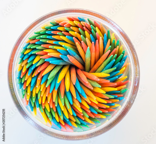 Colorful toothpicks in jar