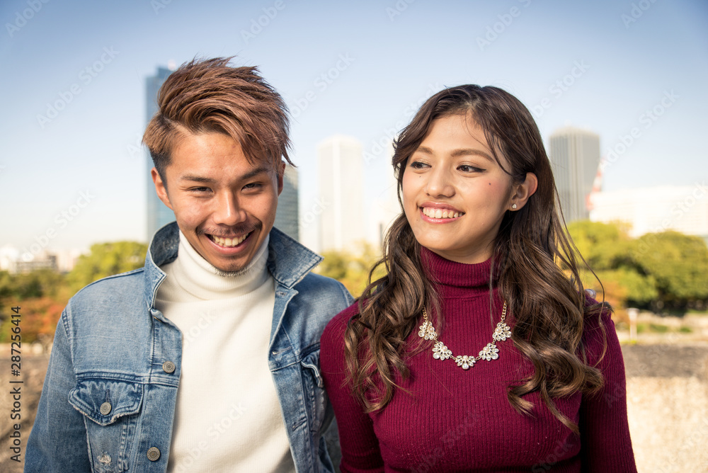 Obraz premium Japanese couple of lovers dating in Osaka