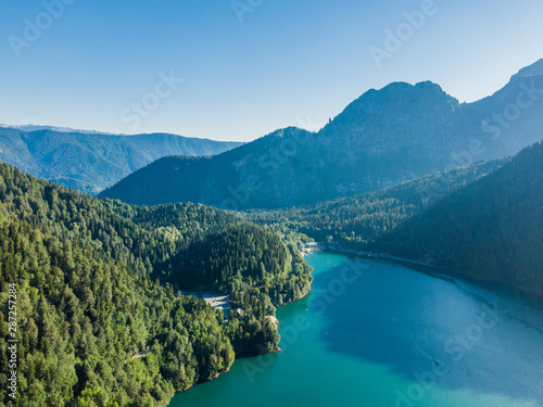 Stunning mountain landscape with a crystal clear blue lake. Aerial view