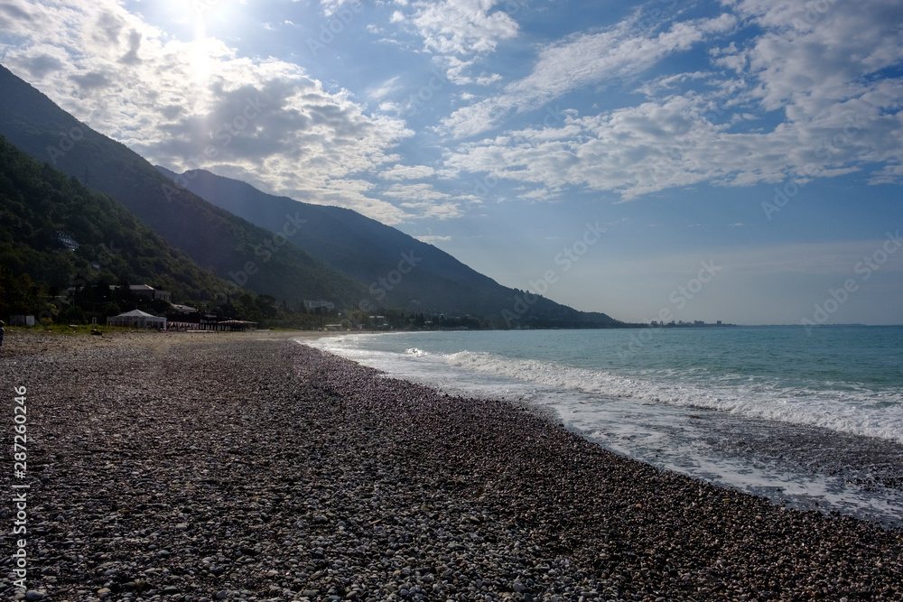 Mountains and pebble beaches of the coast of Gagra. Mountains and pebble beaches of the coast of Gagra.