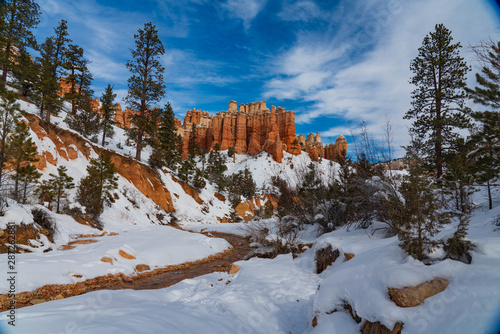 Clouds and Snow Over the Hoodoos in Water Canyon
