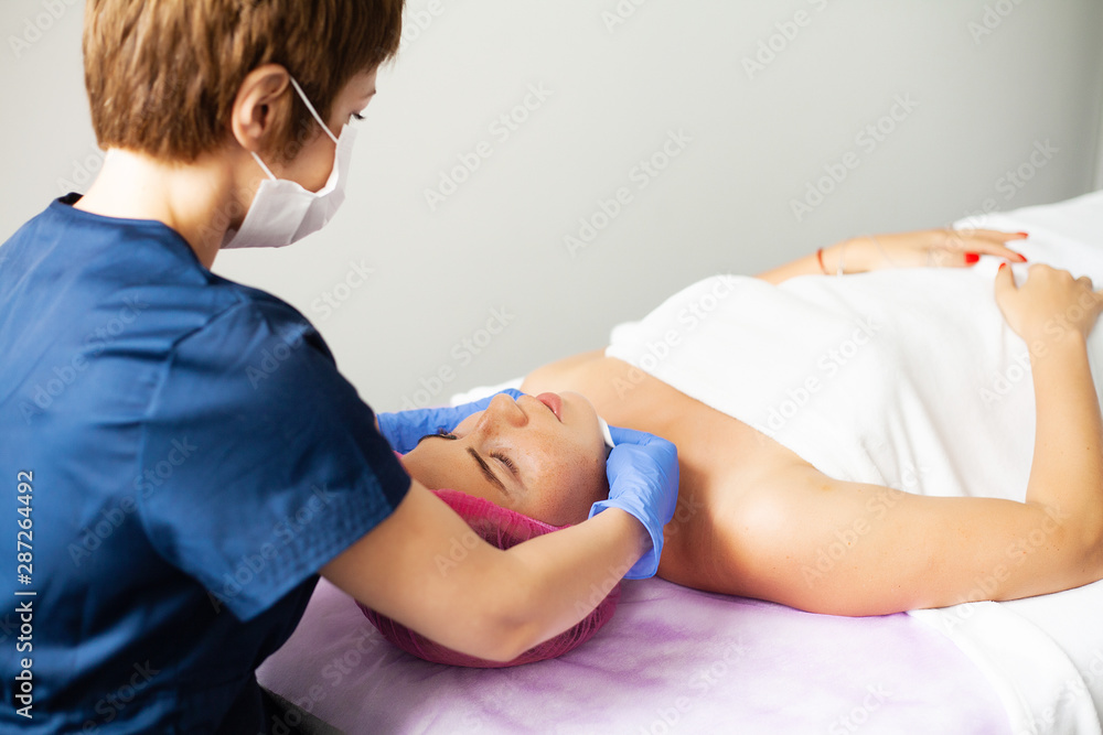Skin And Body Care. Close-up Of A Young Woman Getting Spa Treatment At Beauty Salon. Skin And Body Care. Close-up Of A Young Woman Getting Spa Treatment At Beauty Salon.